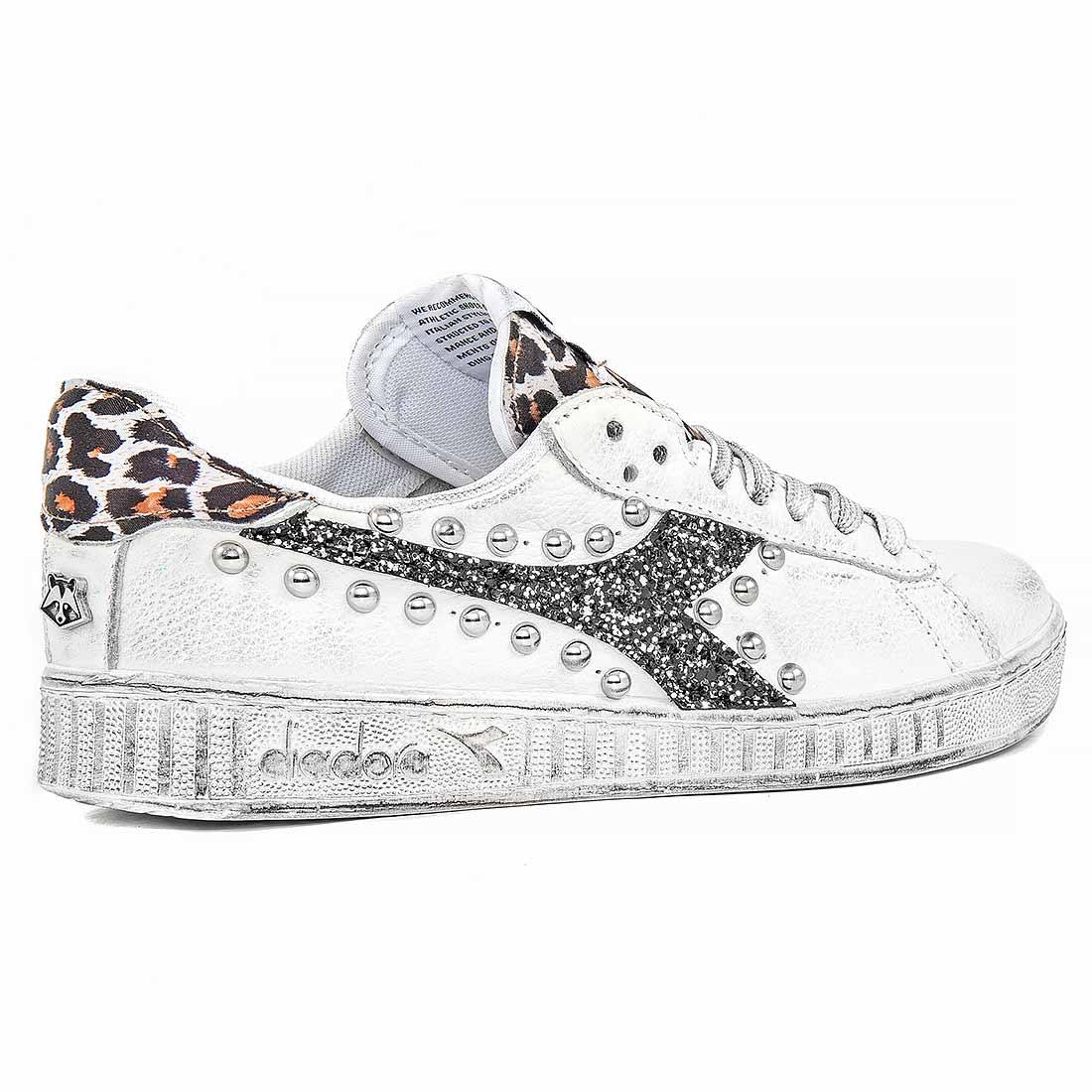Sneakers Diadora Game low borchiate glitterate nere leopardate maculate animalier