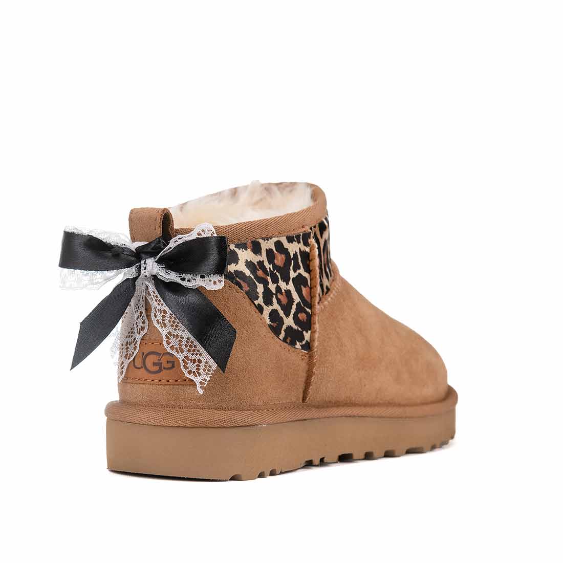 stivaletti ugg maculati con fiocco