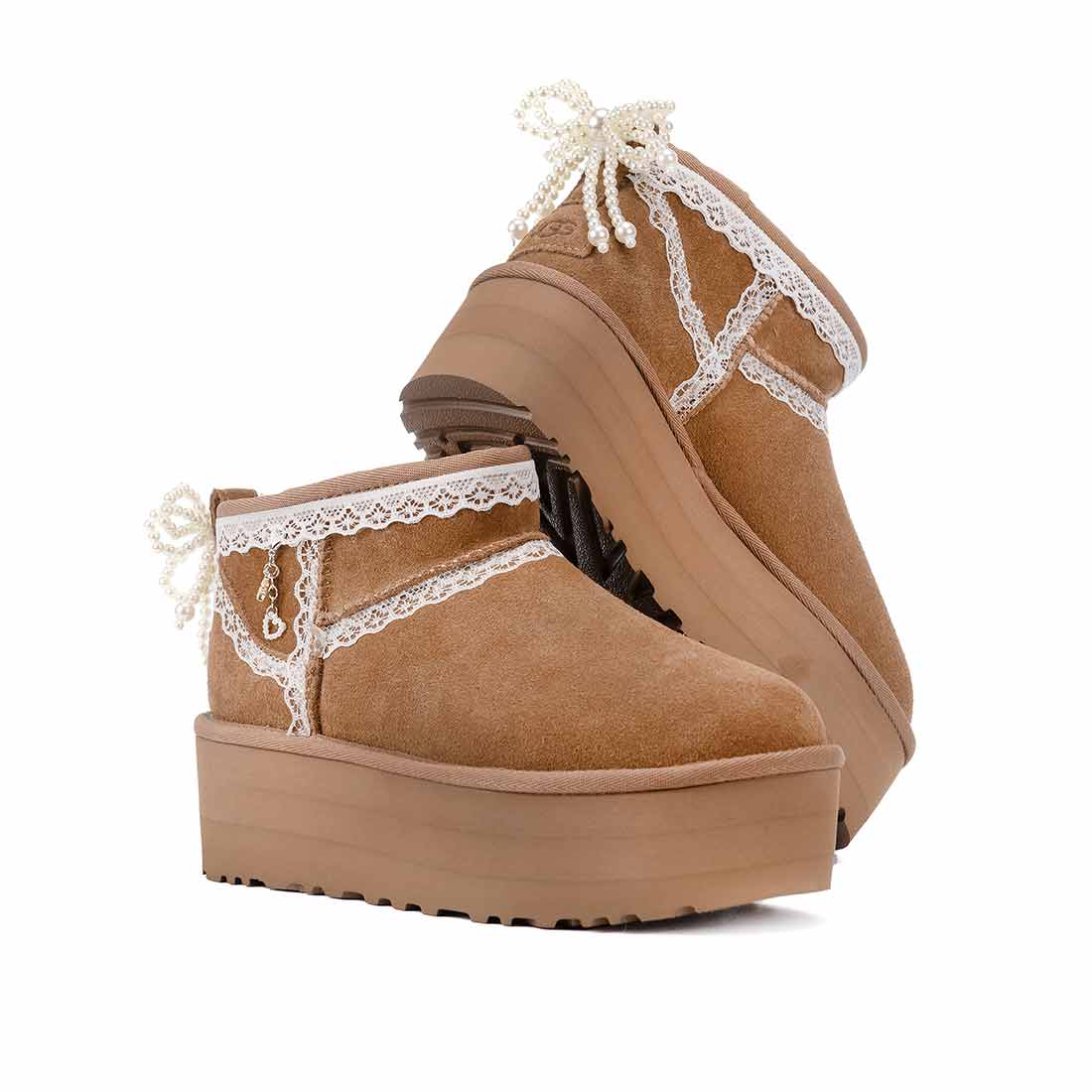 UGG platform con fiocco pizzo e ciondolo 