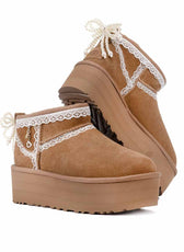 UGG platform con fiocco pizzo e ciondolo 