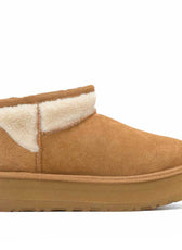 UGG ultra mini platform con pelo bianco stile teddy