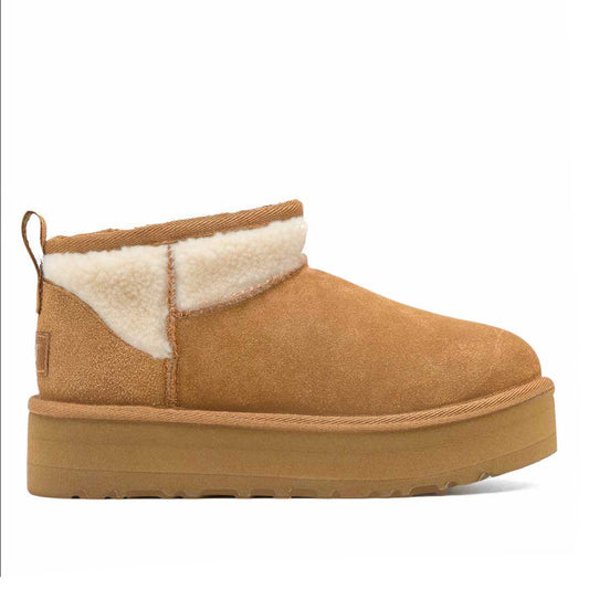 UGG ultra mini platform con pelo bianco stile teddy