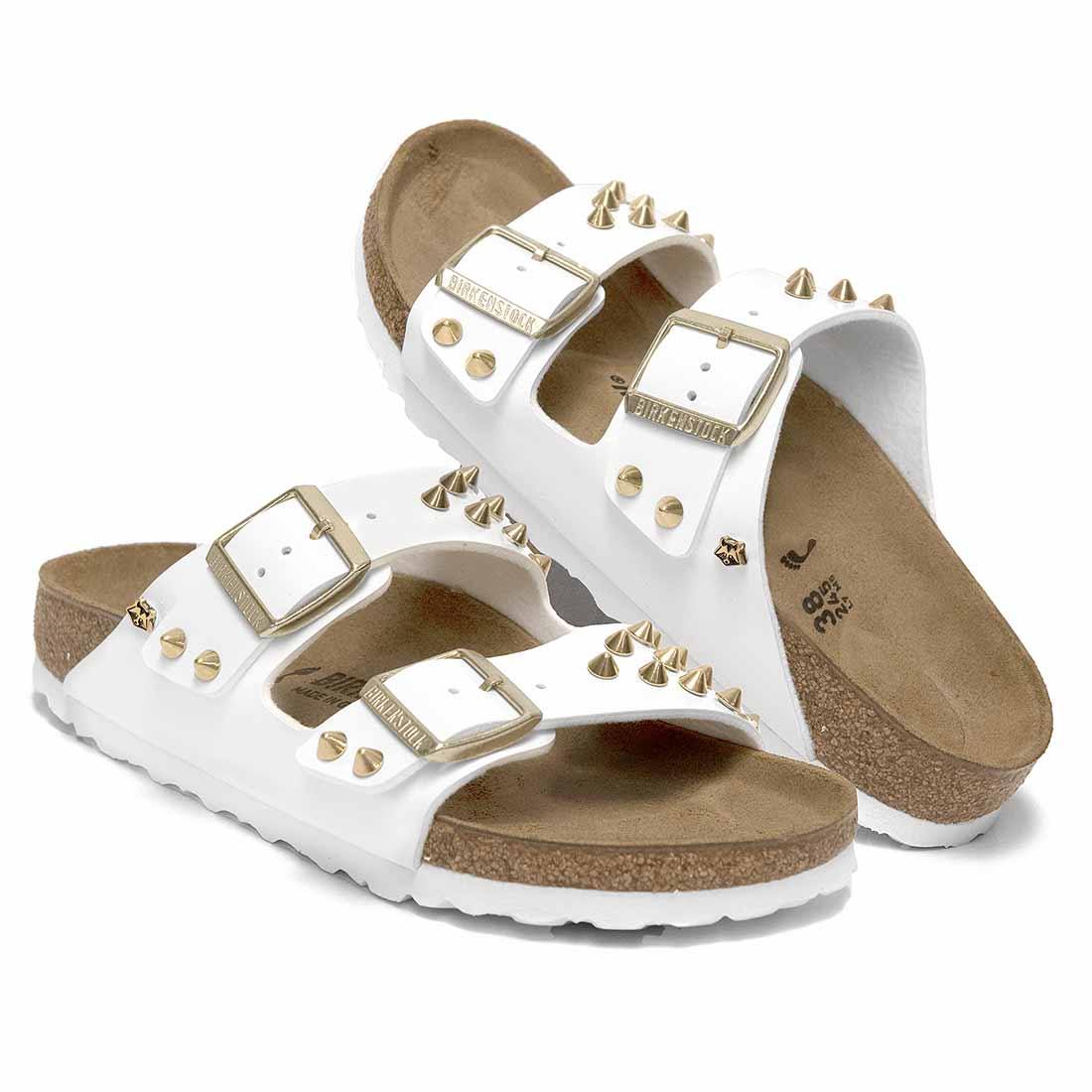 birkenstock arizona bianche lucide borchiate oro