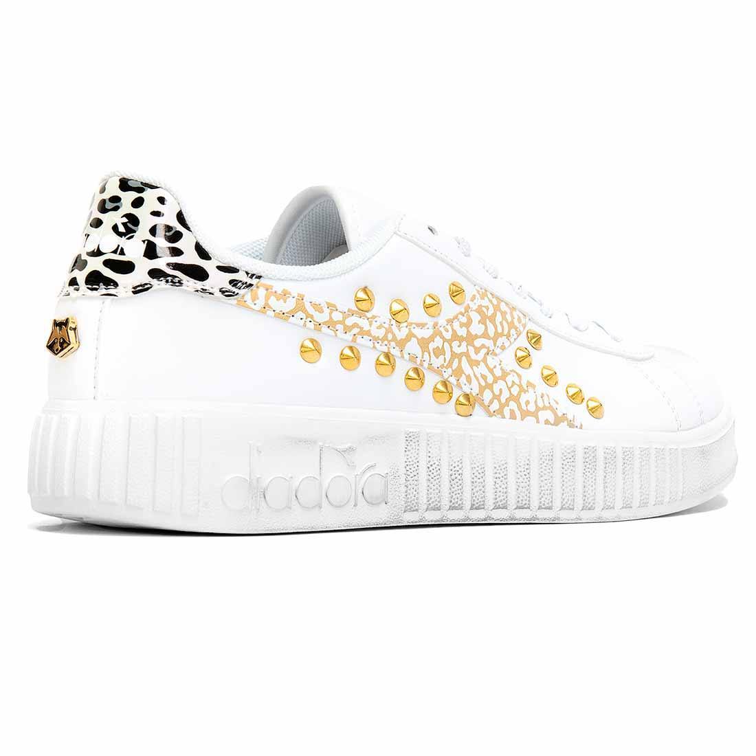 diadora con suola platform leopardate oro borchiate