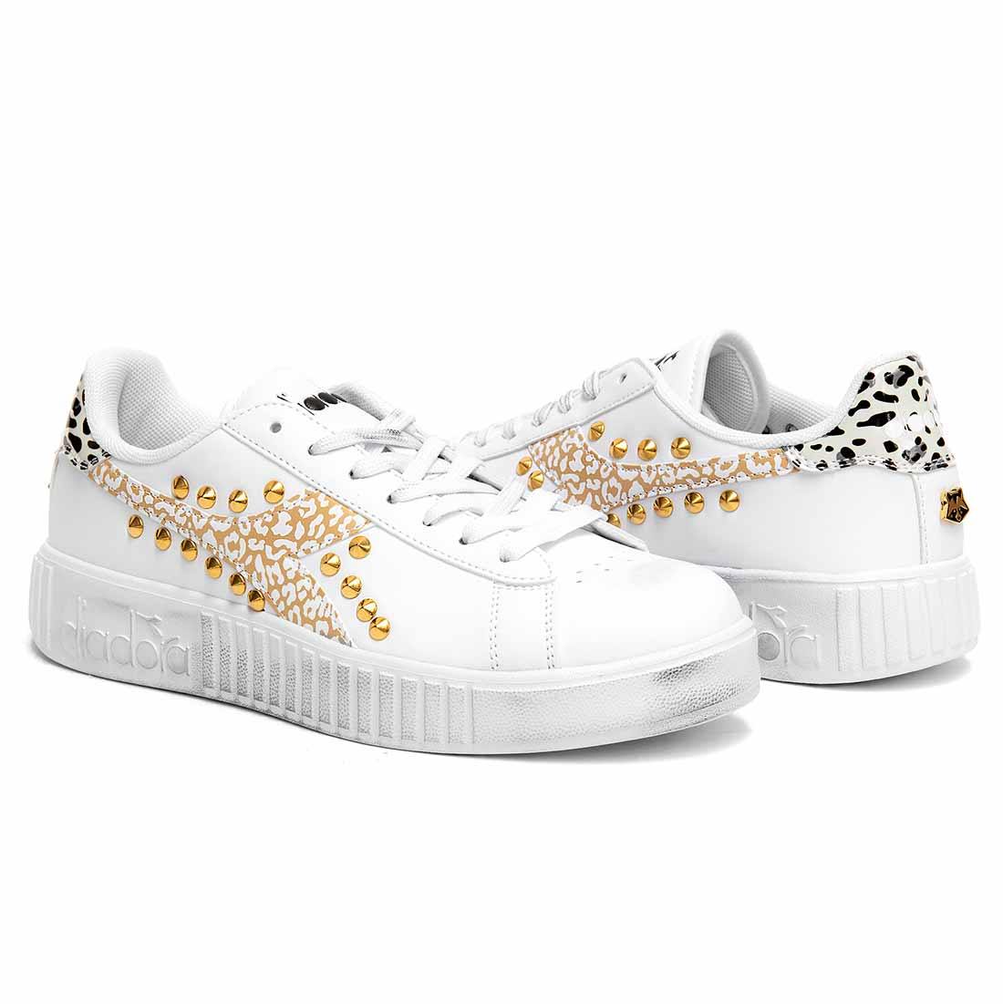 sneakers  con zeppa anilmalier leopardate bianche e oro
